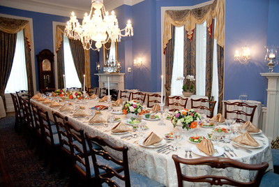 Long table set for a formal Passover seder dinner