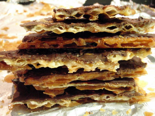 A stack of chocolate toffee matzo. 