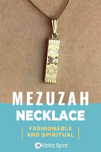 A mezuzah necklace worn around the neck