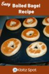 Bagels being made on a baking sheet after being removed from an oven