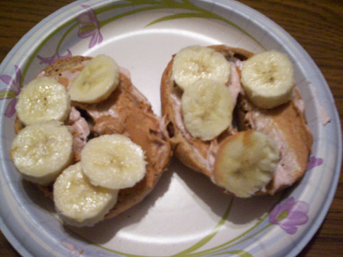 Bagel topped with peanut butter and banana