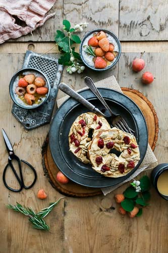 Hummus, cranberry, and pistachio on a bagel