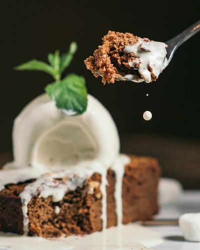 The ultimate gooey chocolate brownies topped with vanilla ice cream