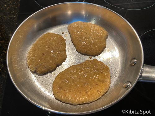 Pancakes cooking in pan