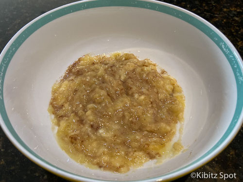 mashed banana with cinnamon in a bowl