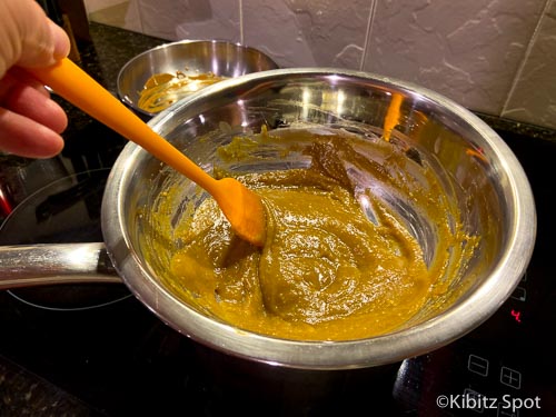 Stirring the caramel into the kaya paste