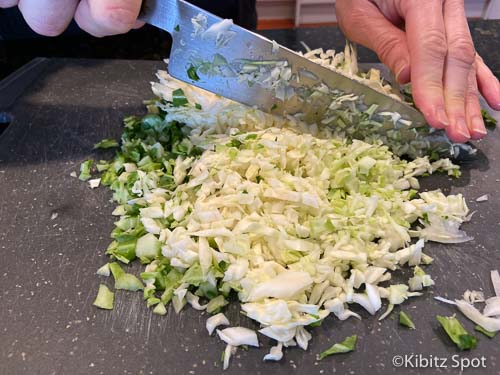 Dice cabbage as the first step to making dairy free coleslaw