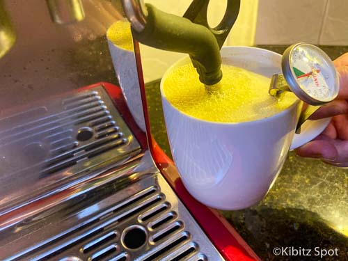 Steaming milk and spices with the espresso machine