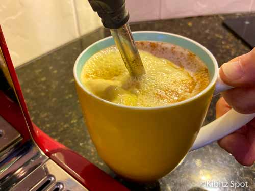 Steaming milk and spices with the espresso machine