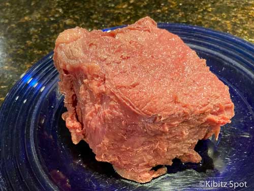 Corned beef brisket just out of the boiling water