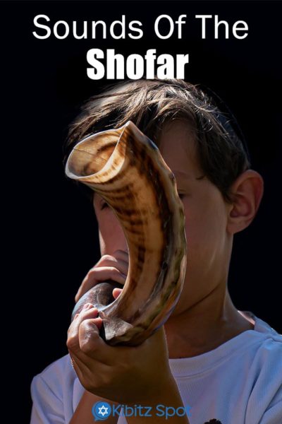 Boy playing the shofar