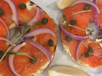 Lox and bagels sandwich with capers and onion as part of our Yom Kippur break fast menu