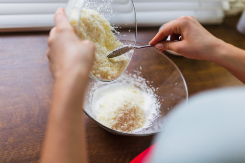 Mixing the ingredients for a gluten free coconut pie