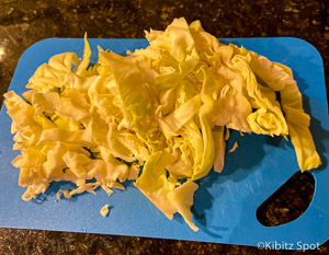 chopped cabbage on a cutting board