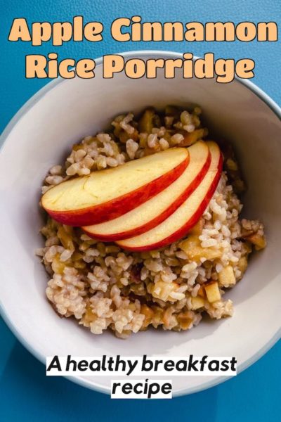 A bowl of Apple Cinnamon Rice Porridge Breakfast with apple slices on top