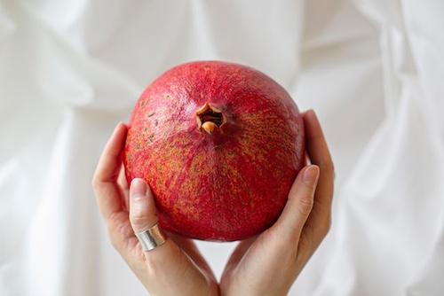pomegranate holds a lot of Rosh Hashanah Food Symbolism.
