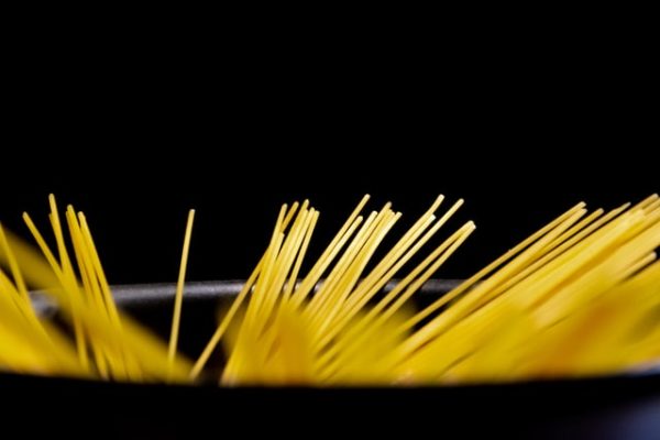 garlic pasta boiling in a pot