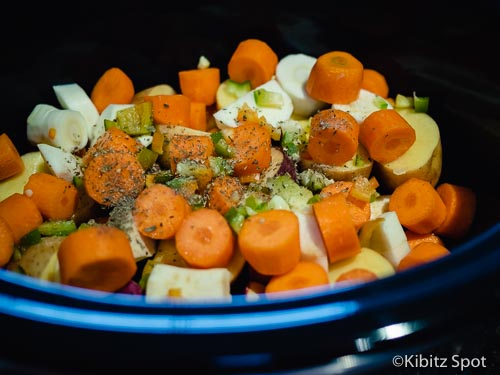 Potato base covered with veggies and spices