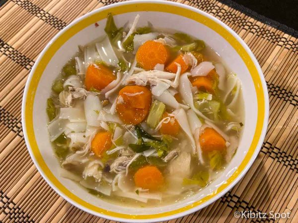 A bowl of gluten-free chicken soup.