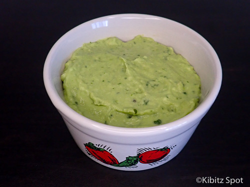 a bowl of creamy avocado ready to eat