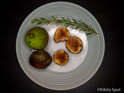 Roasted figs with balsamic and honey glaze on a plate ready to eat