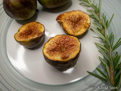 Roasted figs with balsamic and honey glaze on a plate ready to eat