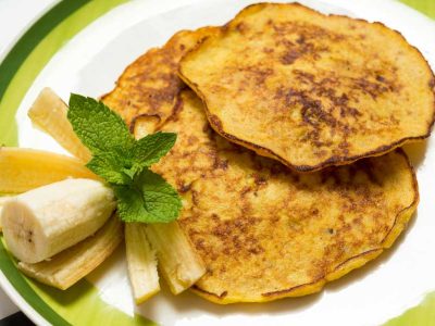 A plate of delicious banana and peanut butter grain-free pancakes