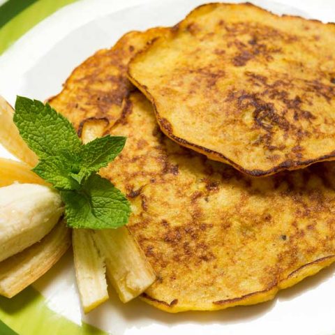 A plate of delicious banana and peanut butter grain-free pancakes