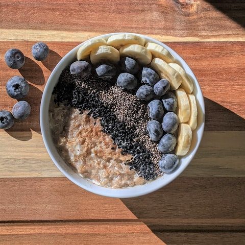 A chia pudding breakfast bowl with blueberries and banana, a delicious gluten free vegan breakfast