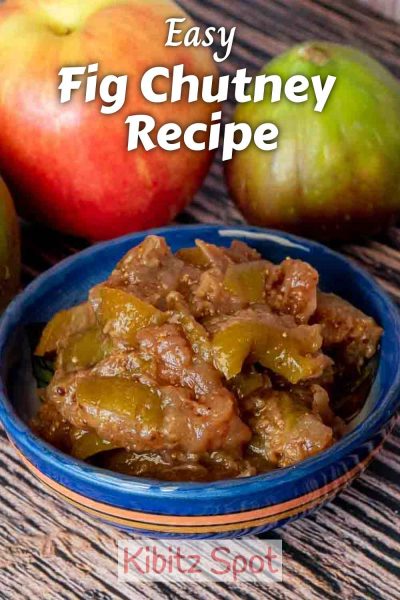 A small bowl of fig chutney with a fig and apple in the background