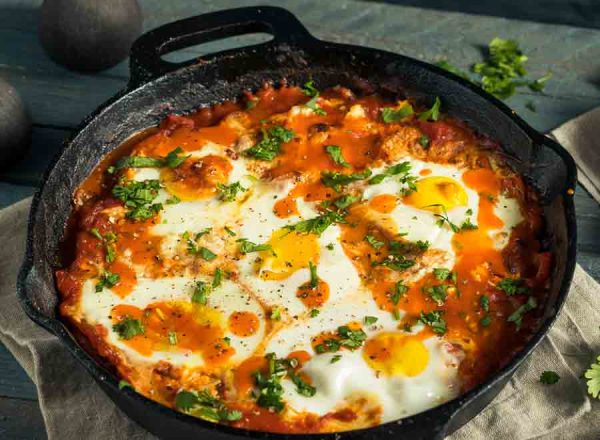 Homemade Saucy Shakshuka with Eggs Cilantro and Tomatoes