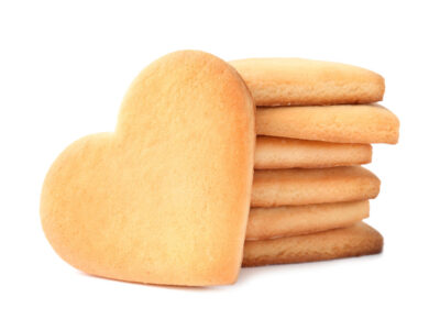 A tray of cooked gingernut biscuits in the oven