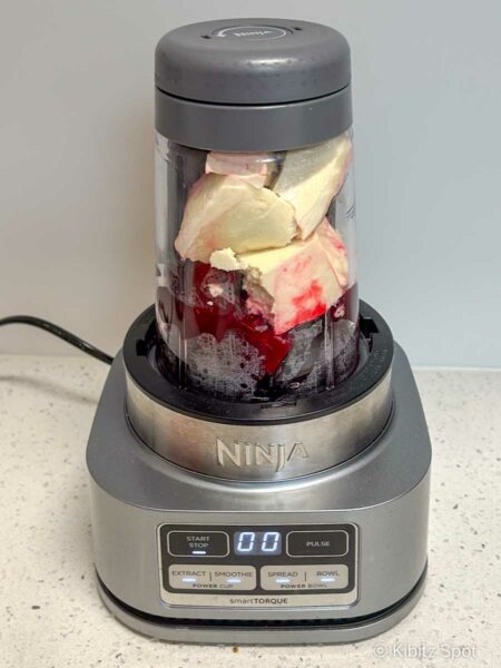 All the ingredients in a Ninja processor cup for making our pink whipped tofu
