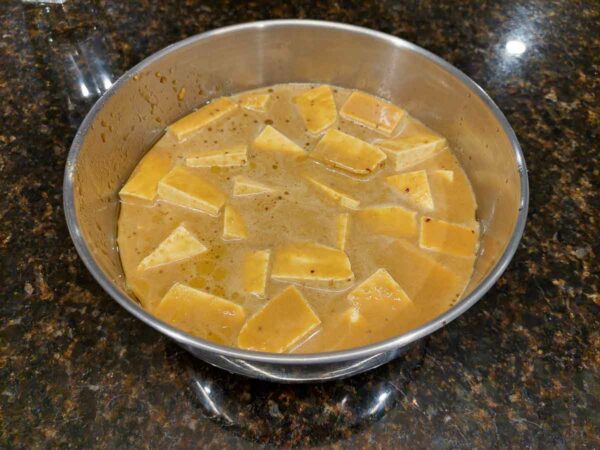 tofu marinating in a maple, dijon mustard, and soy sauce