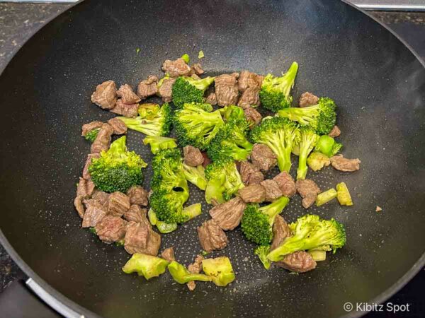 Ingredients in the wok after the beef has been seared